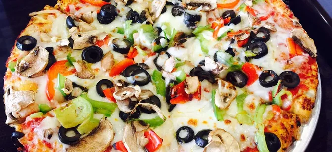 May contain: examples of dishes served in the Pizanos Pizza restaurant, interior or exterior of Pizanos Pizza restaurant