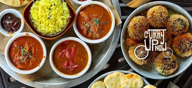 May contain: examples of dishes served in the Curry Up Now - San Ramon restaurant, interior or exterior of Curry Up Now - San Ramon restaurant