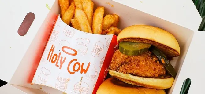May contain: examples of dishes served in the Holy Cow - Fulton St restaurant, interior or exterior of Holy Cow - Fulton St restaurant