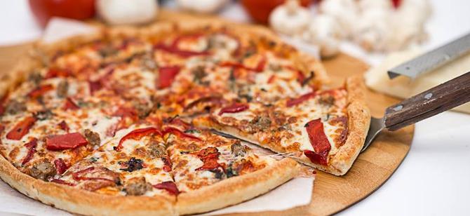 May contain: examples of dishes served in the Soprano's Pizza and Pasta restaurant, interior or exterior of Soprano's Pizza and Pasta restaurant